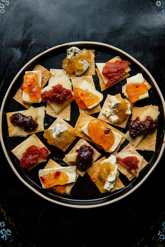 Tray of crackers topped with brie, preserves and Jalapeno Pepper Jelly