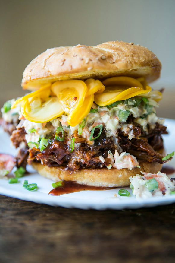 A pulled pork sandwich made with American Spoon Grilling Sauce and coleslaw
