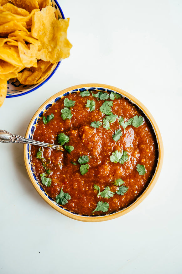A bowl of tortilla chips and American Spoon Salsa